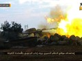 Xe tăng của nhóm thánh chiến Duy Ngô Nhĩ tấn công quân đội Syria ở Idlib. Ảnh truyền thông đối lập Syria