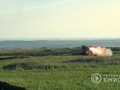 Pháo phản lực "Cheburashka" MLRS bắn thử nghiệm trên thao trường Donesk. Ảnh video