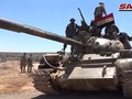Quân đội Syria tiến công trên chiến trường Sweida. Ảnh viddeo SANA