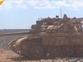 Xe tăng quân đội Syria trên chiến trường Al-Safa. Ảnh minh họa video Sputnik