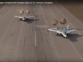 Hai chiếc Su-57 hạ cánh đồng bộ trên một đường băng. Ảnh minh họa video TVZvezda