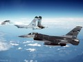 Máy bay tiêm kích đa nhiệm Su-27 và máy bay F-16 của không quân Bỉ.