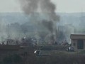 Chiến trường thị trấn Baghouz, Deir Ezzor mịt mù khói lửa. Ảnh minh họa Masdar News
