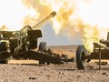 Pháo binh - tên lửa quân đội Syria đánh phá dữ dội chiến tuyến của lực lượng Hồi giáo cực đoan trên khu phi quân sự. Ảnh minh họa: Masdar News.