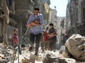 Thành phố Aleppo ở Syria khi xảy ra không kích. Ảnh: Cankao