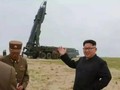 Nhà lãnh đạo Triều Tiên Kim Jong-ul chỉ đạo phóng tên lửa. Ảnh: Thời báo Hoàn Cầu
