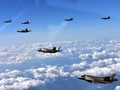 Máy bay chiến đấu tàng hình F-35B Mỹ và máy bay chiến đấu F-15K Hàn Quốc bay theo biên đội ở bán đảo Triều Tiên. Ảnh; Cankao.