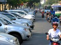 TP. HCM áp dụng thí điểm việc thu phí đỗ xe qua điện thoại là 3 tháng. Ảnh: SGGP
