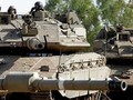 Xe tăng Merkava của Israel hoạt động trên Cao nguyên Golan (Ảnh: AFP)