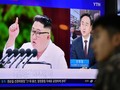 Lãnh đạo Triều Tiên Kim Jong-un trong một bản tin trên truyền hình Hàn Quốc (Ảnh: RT)