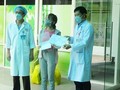 Bệnh nhân được công bố khỏi bệnh tại Bệnh viện Đà Nẵng. Ảnh: Phạm Hằng
