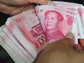 Trung Quốc lại giảm giá mạnh đồng Nhân dân tệ