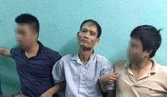 Nghi phạm Doãn Trung Dũng (ở giữa) bị bắt tại Hải Phòng.