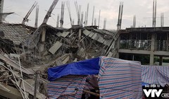 Hiện trường vụ đổ sập công trình trường mầm non Vườn Xanh tại Nam Từ Liêm - Ảnh: Báo điện tử VTV.