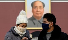 Người dân tại Bắc Kinh, Trung Quốc đeo khẩu trang đề phòng viêm phổi Vũ Hán. Ảnh: AFP.