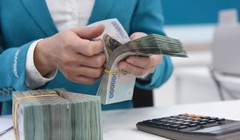 NHNN nới “room” tín dụng lên 14% cho toàn hệ thống ngân hàng