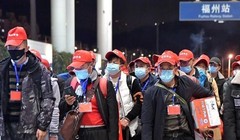 Trung Quốc đã tổ chức các đoàn chuyên xa để đưa đón người lao động quay trở lại làm việc (Ảnh: Đông Phương)