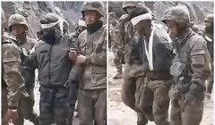 Hình ảnh binh sĩ Ấn Độ bị thương bị lính Trung Quốc bắt dẫn giải (Ảnh: Đông Phương).