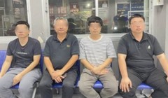 4 người đàn ông Trung Quốc lấy tài liệu bị bắt. Ảnh: SingTao.