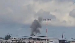 Tên lửa của Houthi rơi xuống gần nhà ga chính của sân bay Ben Gurion. Ảnh: Xinhua.