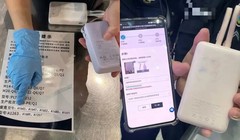 Nhân viên an ninh sân bay đối chiếu danh mục thiết bị sạc vi phạm để thu hồi. Ảnh: Ifeng.