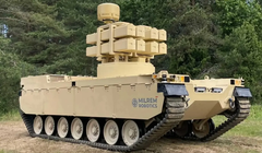 Toàn bộ hệ thống phóng tên lửa tầm xa Akeron LP trên xe robot Type-X. Ảnh: NetEase.