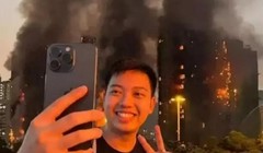 Bức ảnh phản cảm gây phẫn nộ của Trần "Kenny". Ảnh: Wenweipo.