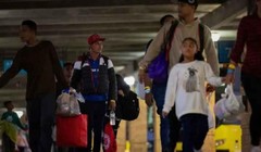 USCIS thông báo giảm thời hạn hiệu lực của Giấy phép lao động (EAD) từ 5 năm xuống 18 tháng, thực hiện từ ngày 5/12. Ảnh: Reuters.