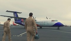 Phi công thử nghiệm máy bay thí nghiệm Dash-300 trước chuyến bay đầu tiên. Ảnh minh họa CNBC.