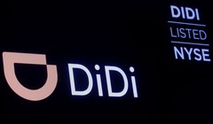 Màn hình hiển thị thông tin giao dịch của tập đoàn dịch vụ gọi xe công nghệ Didi Global trên sàn Sở giao dịch chứng khoán New York tại Thành phố New York, Mỹ, ngày 3/12/ 2021. Ảnh Reuters
