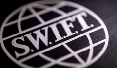 SWIFT đang nỗ lực cải tổ dựa trên blockchain. Ảnh: Reuters.