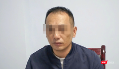 Đối tượng Zhangmao tại cơ quan công an. Ảnh: Công an cung cấp.