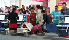 Hành khách làm thủ tục - Ảnh minh họa