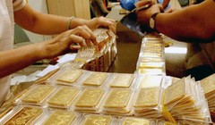 Lúc 13g30 ngày 13-8, giá vàng thế giới ở 1.121,7 USD/ounce