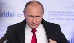 Tổng thống Nga Vladimir Putin tự ví mình là một chú chim bồ câu nhưng có đôi cánh thép - Ảnh: AFP