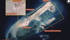 Hoạt động xây dựng của Trung Quốc ở bãi đá Chữ Thập hôm 14/11. Ảnh: IHS Jane's