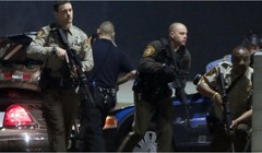 Vụ nổ súng xảy ra ngay bên ngoài trụ sở cảnh sát Ferguson (Ảnh: BBC)