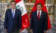 Tổng thống Peru Ollanta Humala (phải) và Thủ tướng Trung Quốc Lý Khắc Cường. Ảnh: AFP