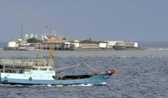 Công trình xây dựng trái phép của Trung Quốc trên bãi đá Chữ Thập thuộc quần đảo Trường Sa của Việt Nam - Ảnh: The Week Magazine