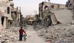 Một khu phố đổ nát ngoại ô Damascus đã tìm lại được hòa bình