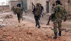 Các binh sĩ Syria kiểm soát một khu dân cư được giải phóng khỏi lực lượng Hồi giáo cực đoan