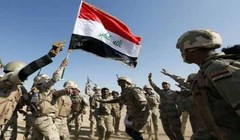 Binh sĩ quân đội Iraq ăn mừng chiến thắng trên đường tiến về Mosul