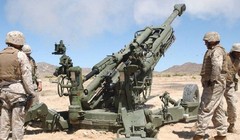 Lính Mỹ pháo kích yểm hộ lực lượng dân quân người Kurd ở Syria