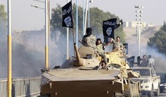 Xe thiết giáp của IS tiến công vào chiến tuyến của quân đội Syria - ảnh minh hỏa Masdar News