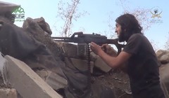 Một chiến binh thánh chiến thuộc tổ chức Ahrar Al-Sham, nhóm thánh chiến lớn thứ 2 sau FSA tấn công trên địa phận tỉnh Homs - ảnh video đối lập