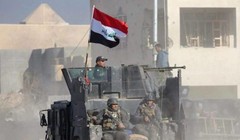 Binh sĩ quân đội Iraq trong một khu dân cư gần biên giới với Syria, chuẩn bị cho cuộc tấn công mới - ảnh minh họa Masdar News