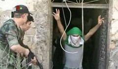 Các tay súng nổi dậy tiếp tục đầu hàng quân đội Syria - ảnh minh họa Masdar News