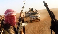 Các phần tử khủng bố IS trên sa mạc tỉnh Homs - ảnh minh họa Masdar News