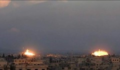 Pháo binh quân đội Syria bắn phá chiến tuyến phiến quân ở Đông Ghouta - ảnh minh họa Masdar News