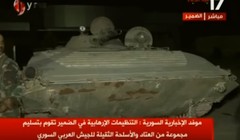 Lực lượng Hồi giáo cực đoan giao nộp xe bộ binh chiến đấu BMP-1 cho quân đội Syria. Ảnh minh họa video Alikhbaria Syria